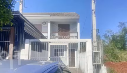 Casa com 2 quartos à venda na Rua Maria Onofrina Mendonça Torres, 104, Mário Quintana, Porto Alegre, 76 m2 por R$ 319.000
