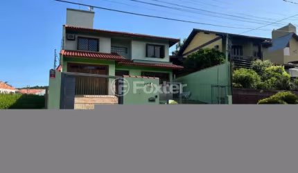 Casa com 3 quartos à venda na Rua Alberto Zimermann, 797, Rio Branco, São Leopoldo, 163 m2 por R$ 890.000