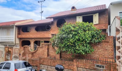 Casa com 4 quartos à venda na Rua São Cristóvão, 207, Coqueiros, Florianópolis, 151 m2 por R$ 990.000