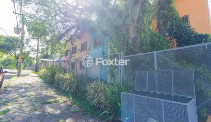Casa em condomínio fechado com 2 quartos à venda na Rua Ângelo Crivellaro, 105, Jardim do Salso, Porto Alegre, 68 m2 por R$ 250.000
