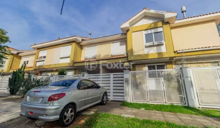 Casa em condomínio fechado com 3 quartos à venda na Rua Cangussu, 680, Nonoai, Porto Alegre, 130 m2 por R$ 495.000