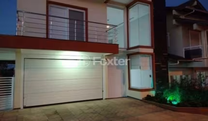 Casa em condomínio fechado com 4 quartos à venda na Rua Antônio Ramos, 40, Loteamento Jardim Timbaúva, Gravataí, 268 m2 por R$ 930.000