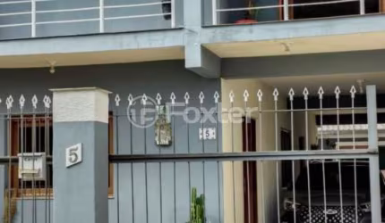 Casa com 3 quartos à venda na Rua Moroty Baldwin Michel, 5, Rubem Berta, Porto Alegre, 183 m2 por R$ 690.000