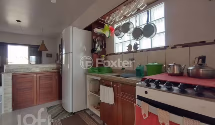 Casa com 3 quartos à venda na Rua Peterson Assunção, 71, Enseada de Brito, Palhoça, 118 m2 por R$ 700.000