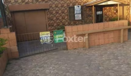 Casa com 3 quartos à venda na Avenida Edgar Pires de Castro, 3190, Restinga, Porto Alegre, 160 m2 por R$ 750.000