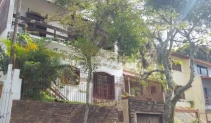 Casa com 4 quartos à venda na Rua Nero José da Silva Filho, 205, Partenon, Porto Alegre, 260 m2 por R$ 650.000