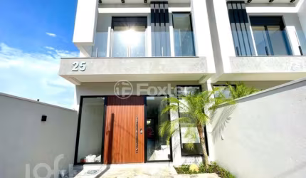 Casa com 3 quartos à venda na Rua Henrique Kranen Filho, 21, Estância Velha, Canoas, 128 m2 por R$ 839.000
