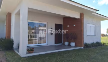 Casa com 3 quartos à venda na Rua Claudio Henrique Alberti, 230, Bosque do Albatroz, Osório, 150 m2 por R$ 1.050.000