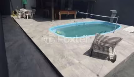 Casa em condomínio fechado com 3 quartos à venda na Rua Dário Manoel Cardoso, 1545, Ingleses do Rio Vermelho, Florianópolis, 100 m2 por R$ 650.000