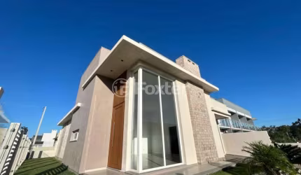 Casa com 3 quartos à venda na Rua Da Garça, 125, Bosque do Albatroz, Osório, 114 m2 por R$ 690.000