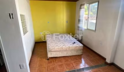 Casa com 5 quartos à venda na Rua Itacurubi, 35, Vila Nova, Porto Alegre, 100 m2 por R$ 330.000
