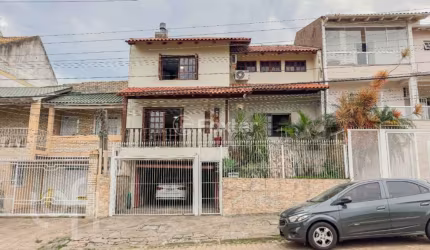 Casa com 4 quartos à venda na Rua Paulo Madureira Coelho, 380, Morro Santana, Porto Alegre, 338 m2 por R$ 1.100.000