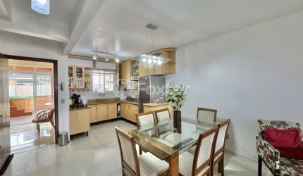 Casa com 3 quartos à venda na Rua Raymundo Luiz Marinho Filho, 299, Parque Santa Fé, Porto Alegre, 125 m2 por R$ 615.000