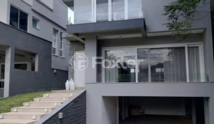 Casa em condomínio fechado com 3 quartos à venda na Avenida Senador Salgado Filho, 8500, Querência, Viamão, 271 m2 por R$ 1.300.000