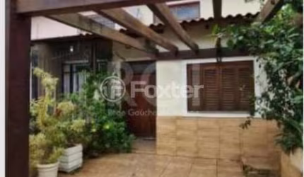 Casa com 2 quartos à venda na Rua Hilário Gonçalves Pinha, 85, Hípica, Porto Alegre, 103 m2 por R$ 330.000