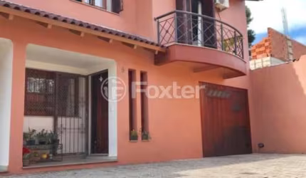 Casa em condomínio fechado com 3 quartos à venda na Rua Oscar Schneider, 83, Medianeira, Porto Alegre, 173 m2 por R$ 650.000