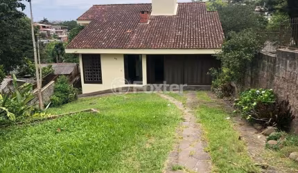 Casa com 4 quartos à venda na Rua da Gruta, 60, Cascata, Porto Alegre, 241 m2 por R$ 550.000