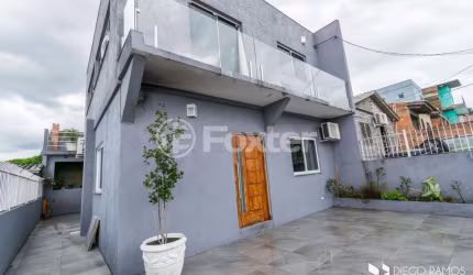 Casa com 3 quartos à venda na Rua Três Mil Setecentos e Quarenta e Oito, 871, Lomba do Pinheiro, Porto Alegre, 160 m2 por R$ 550.000