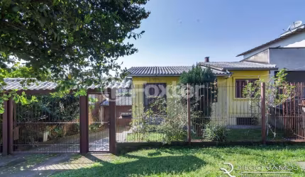 Casa com 3 quartos à venda na Avenida Outeiro, 368, Coronel Aparício Borges, Porto Alegre, 98 m2 por R$ 330.000