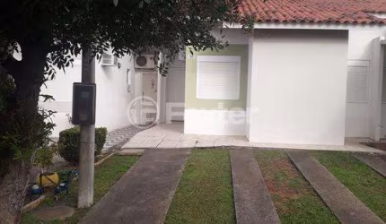 Casa em condomínio fechado com 3 quartos à venda na Estrada Caminho do Meio, 5425, Stella Maris, Alvorada, 66 m2 por R$ 320.000