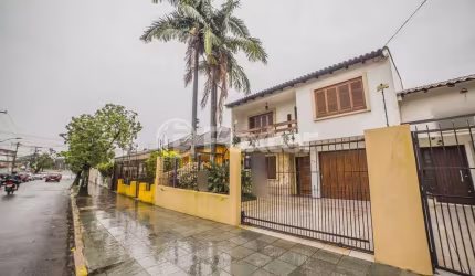 Casa comercial com 3 salas à venda na Rua Otávio Dutra, 76, Santa Tereza, Porto Alegre, 238 m2 por R$ 1.172.000