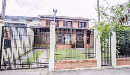 Casa com 6 quartos à venda na Rua Professor Pedro Santa Helena, 255, Jardim do Salso, Porto Alegre, 300 m2 por R$ 850.000