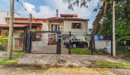 Casa com 3 quartos à venda na Rua Cassino, 75, Ipanema, Porto Alegre, 379 m2 por R$ 980.000
