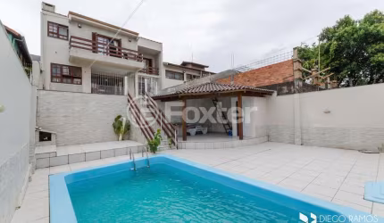 Casa com 4 quartos à venda na Rua Paul Harris, 130, Jardim Itu Sabará, Porto Alegre, 245 m2 por R$ 1.450.000