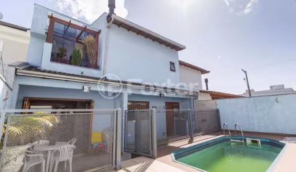 Casa em condomínio fechado com 4 quartos à venda na Rua Ângelo Raphael Frizzo, 95, Mário Quintana, Porto Alegre, 200 m2 por R$ 920.000
