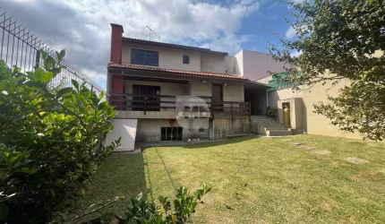 Casa com 4 quartos à venda na Rua Doutor Sátilas do Amaral Camargo, 1167, Tingui, Curitiba por R$ 997.500