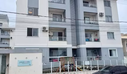 Apartamento a venda de 02 Dormitórios com mobília planejada no bairro Forquílhas em São José-SC