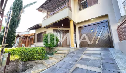 Casa com 4 quartos à venda na Rua Juruá, 105, Cristo Redentor, Porto Alegre, 366 m2 por R$ 1.290.000