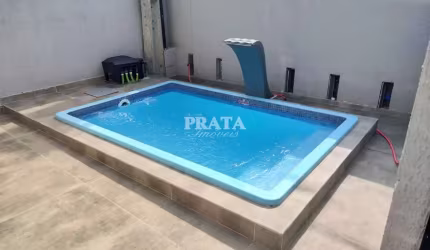 MACUCO SANTOS CASAS NOVAS EM VILLAGIO 2 SUÍTES 1 VAGA GARAGEM