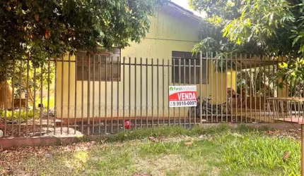 Terreno no centro com casa
