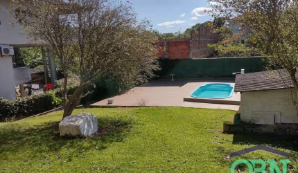 Casa com 4 dormitórios à venda, 240 m² por R$ 2.500.000,00 - Morro de Nova Cintra - Santos/SP