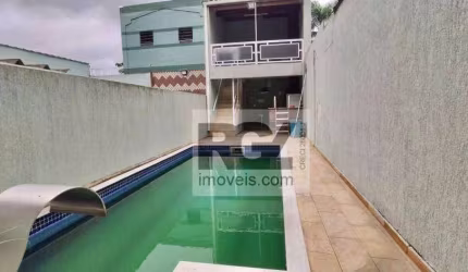 Casa com 3 dormitórios à venda, 210 m² por R$ 950.000,00 - Macuco - Santos/SP