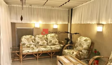 Casa em condomínio fechado com 4 quartos à venda na Avenida Açucena, Estância Velha, Canoas, 233 m2 por R$ 1.380.000