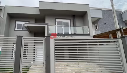 Casa com 3 quartos à venda na Rua Constantino Moura de Azevedo, Estância Velha, Canoas, 225 m2 por R$ 1.390.000