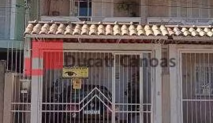 Casa com 3 quartos à venda na Rua Columbia, Mato Grande, Canoas, 133 m2 por R$ 320.000