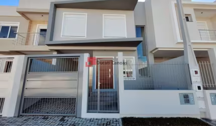 Casa com 3 quartos à venda na Rua Frei Henrique de Coimbra, Nossa Senhora das Graças, Canoas, 128 m2 por R$ 654.000