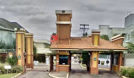 Terreno em condomínio fechado à venda no Marechal Rondon, Canoas  por R$ 1.250.000