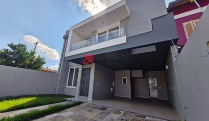 Sobrado 220m², 3 suítes, gabinete, garagem para 2 carros