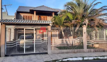Casa com 3 quartos à venda na Rua Júlio Pereira de Souza, Estância Velha, Canoas, 280 m2 por R$ 835.000