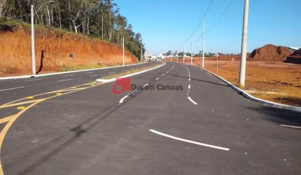 Terreno em condomínio fechado à venda no Marechal Rondon, Canoas  por R$ 690.000