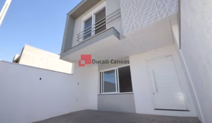 Casa com 3 quartos à venda na Rua Ravena, Estância Velha, Canoas, 145 m2 por R$ 690.000