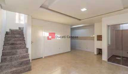 Casa em condomínio fechado com 3 quartos à venda na Rua Antônio Lourenço Rosa, Mato Grande, Canoas, 98 m2 por R$ 389.000