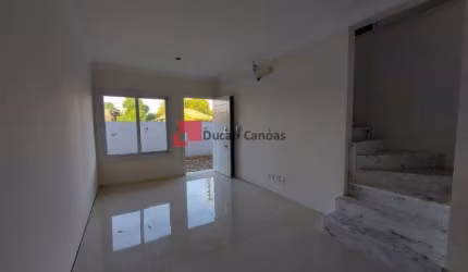 Casa em condomínio fechado com 3 quartos à venda na Rua Protásio Alves, Niterói, Canoas, 129 m2 por R$ 560.000