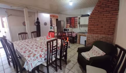 Casa em condomínio fechado com 3 quartos à venda na Rua B, Olaria, Canoas, 120 m2 por R$ 458.000