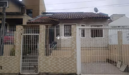 Casa com 3 quartos à venda na Rua Doutor Cláudio Walter Ferreira da Silva, 171, Guarujá, Porto Alegre, 200 m2 por R$ 600.000