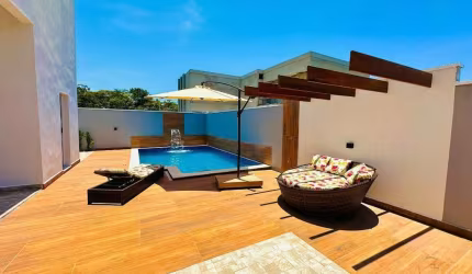 Casa com 3 dormitórios, sendo 3 suítes no Res. Bosque Três Marias em Peruíbe / SP